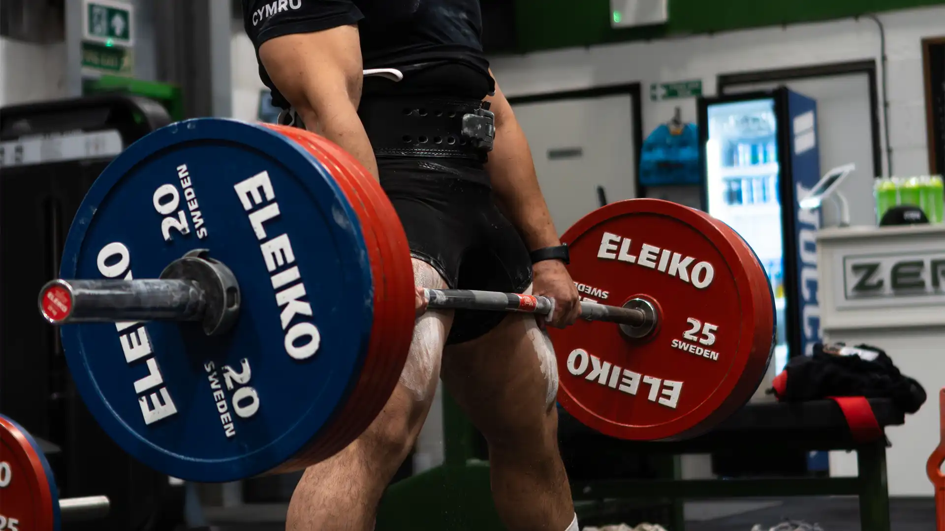 A lifter pulling a deadlift with Eleiko plates at ZeroW Wales