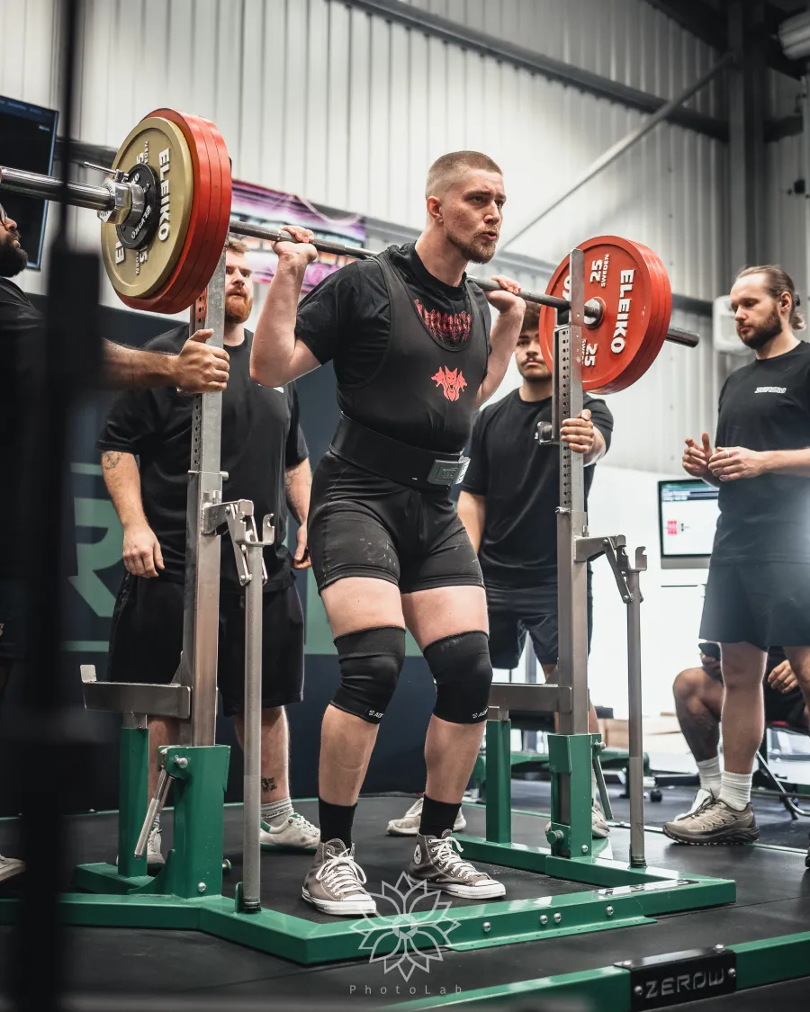 A lifter set up for a squat in the monolift, viewed from the front
