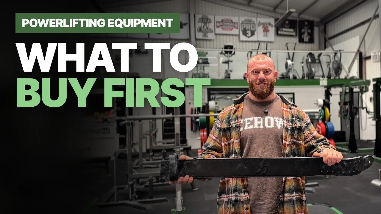 Jordan Helyer holding a lever belt with the text What to buy first, powerlifting equipment